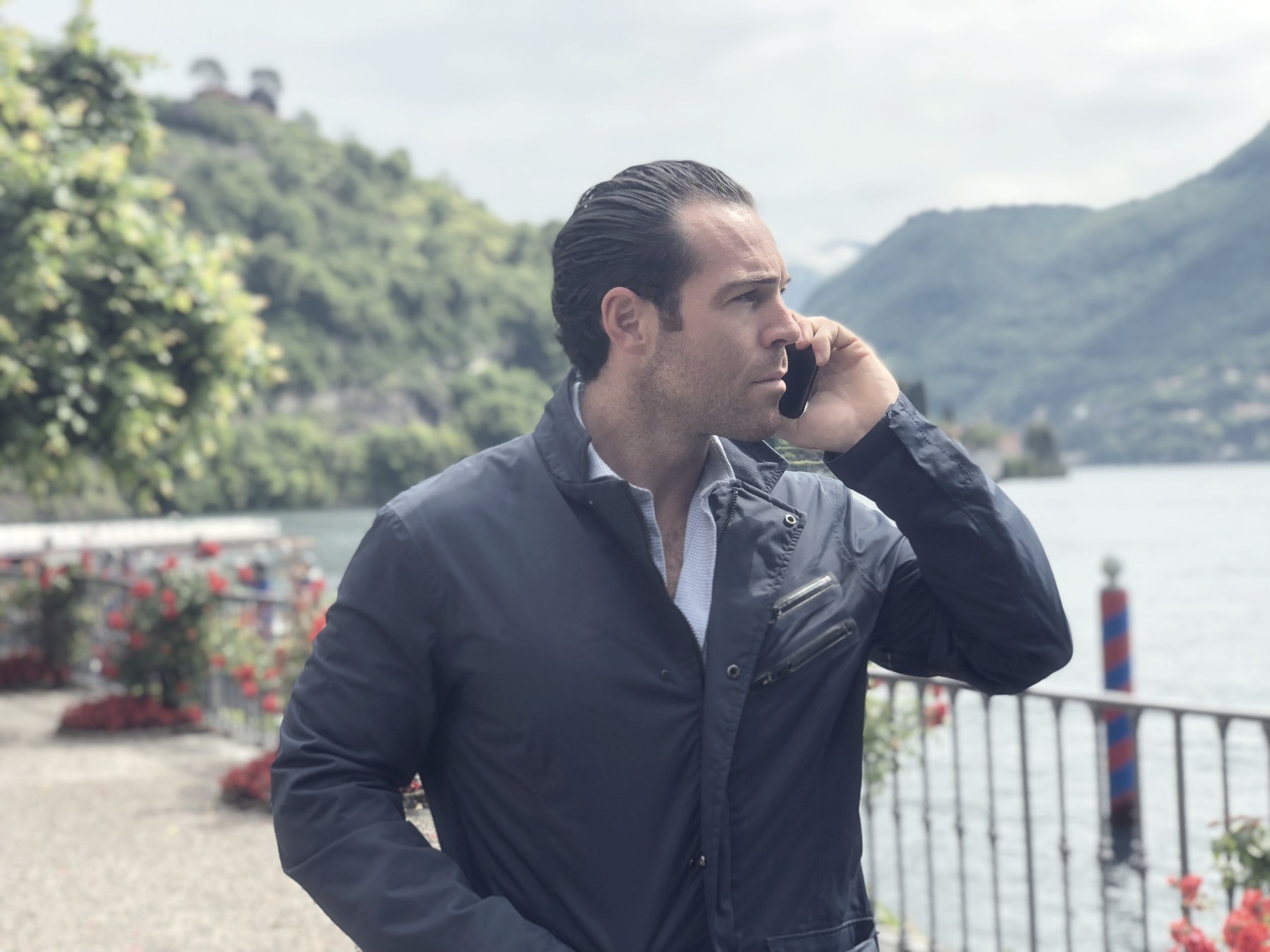 Max Musina, film producer, working remotely at Lake Como between productions, Italy